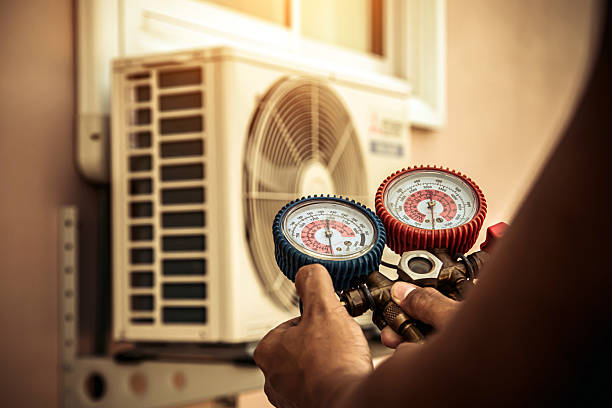 Professional Hvac technician working in Jacksonville, AL